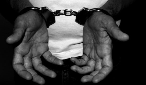 Hands in handcuffs