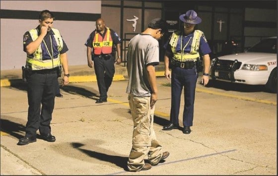 A man taking a walk and turn test.